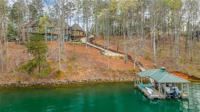 view of dock featuring a water view and boat lift