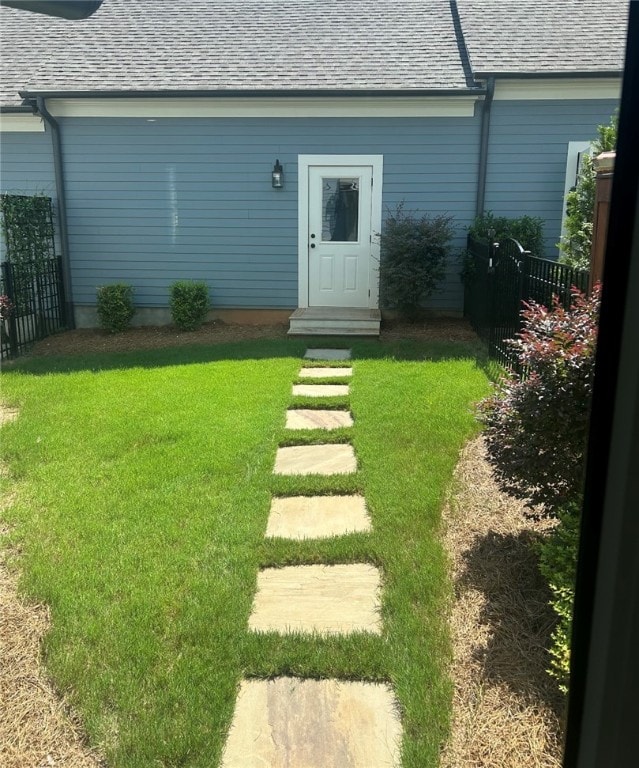 exterior space featuring a lawn