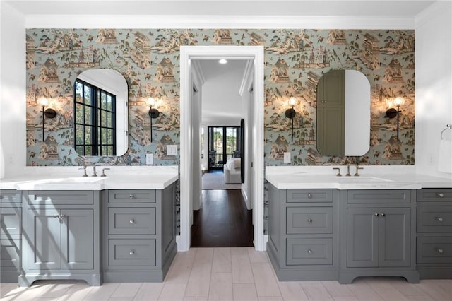 bathroom featuring vanity and crown molding