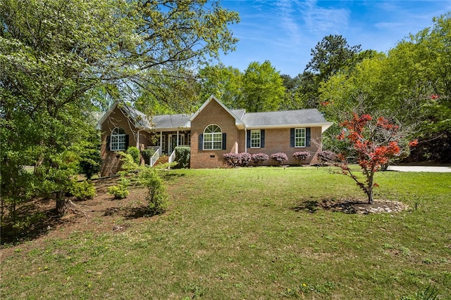 ranch-style house with a front yard