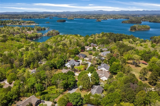 aerial view featuring a water and mountain view