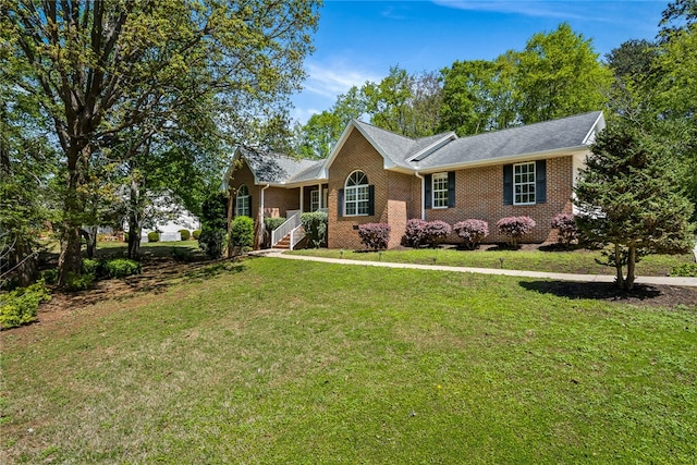 ranch-style house with a front yard