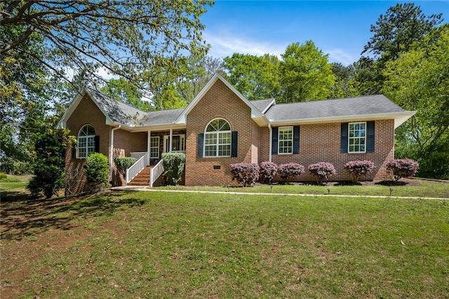 ranch-style house with a front yard