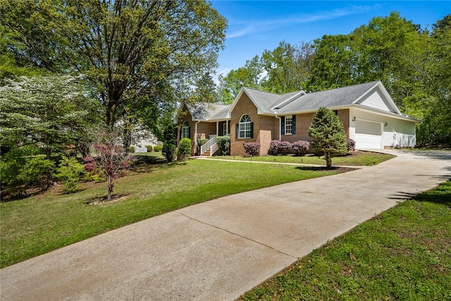 single story home with a front yard and a garage