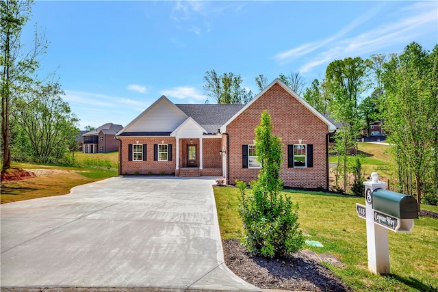 view of front of home with a front yard