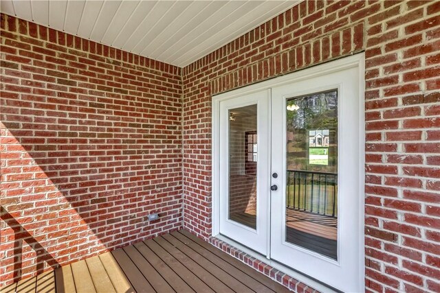 entrance to property featuring french doors