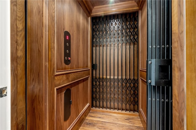 room details featuring elevator and hardwood / wood-style floors