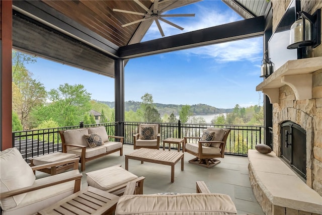 view of patio / terrace with an outdoor living space and ceiling fan