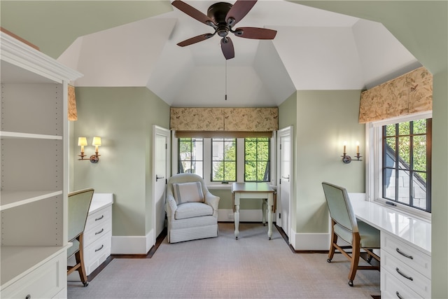 home office featuring vaulted ceiling and ceiling fan