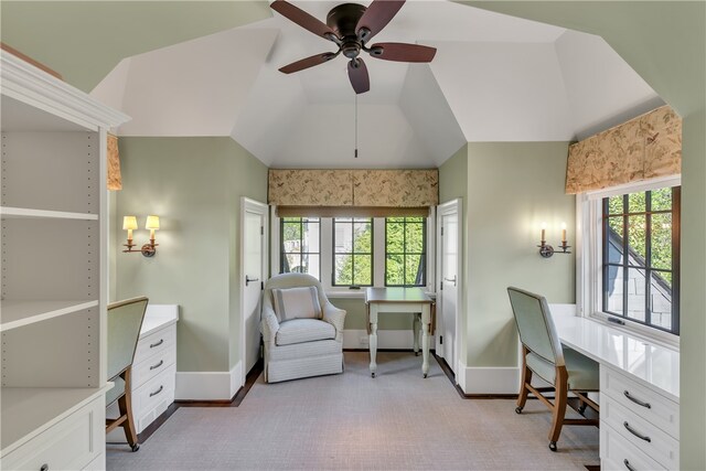 home office featuring vaulted ceiling and ceiling fan