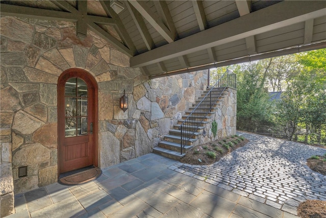 doorway to property featuring a patio area