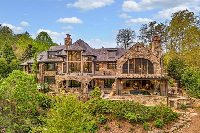 back of house featuring a patio area