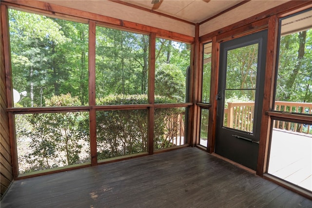 unfurnished sunroom featuring plenty of natural light