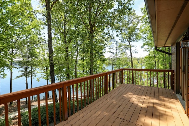 wooden terrace with a water view