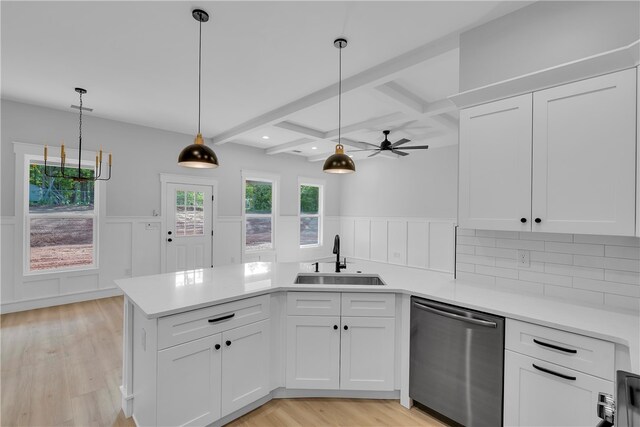 kitchen with light hardwood / wood-style floors, white cabinetry, beamed ceiling, stainless steel dishwasher, and sink