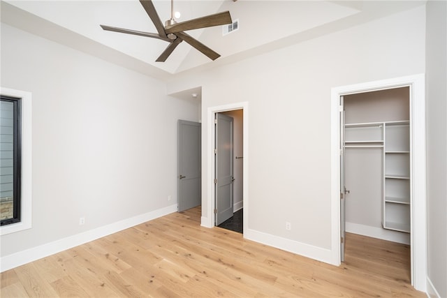 unfurnished bedroom featuring light wood-type flooring and ceiling fan