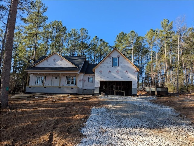 unfinished property featuring a porch