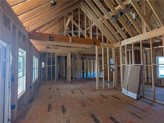 miscellaneous room featuring lofted ceiling