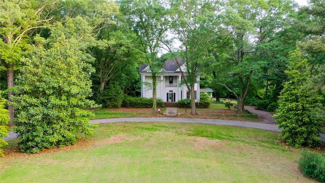 exterior space with a front lawn