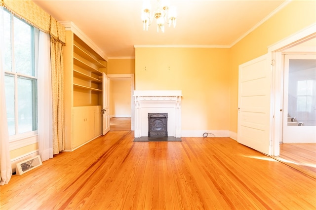 unfurnished living room with wood-type flooring and crown molding