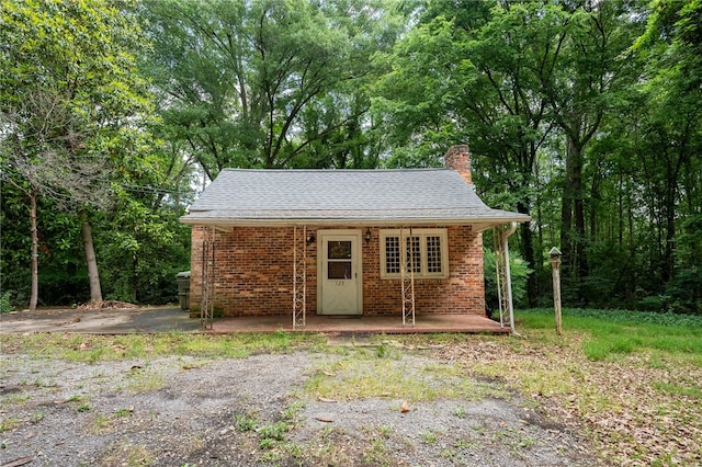 view of outdoor structure with a porch