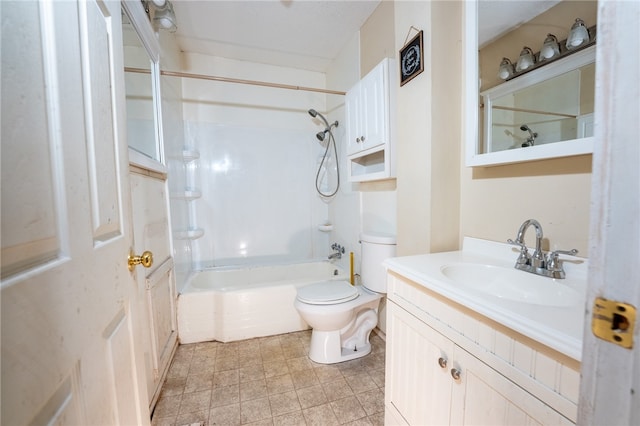 full bathroom featuring washtub / shower combination, vanity, and toilet