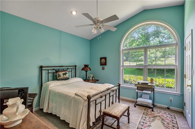 bedroom with carpet, ceiling fan, and multiple windows