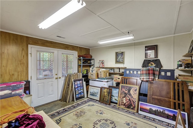 miscellaneous room with concrete floors and french doors