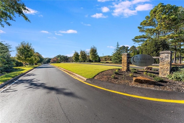 view of street featuring curbs