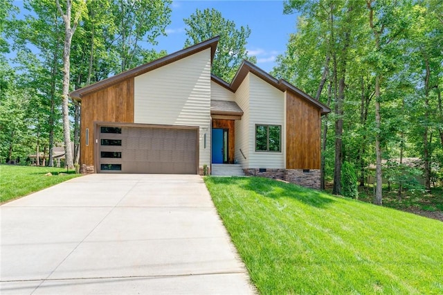 modern home with a garage and a front yard