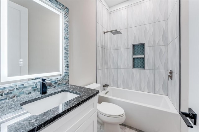 full bath featuring vanity, bathing tub / shower combination, backsplash, and toilet