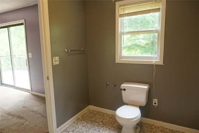 bathroom featuring toilet