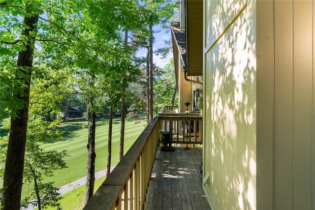 wooden deck with a yard