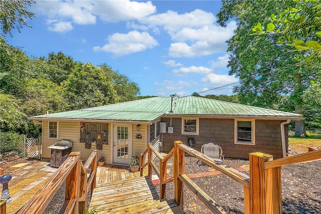 view of front of house with a deck