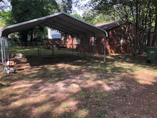 view of yard featuring a carport