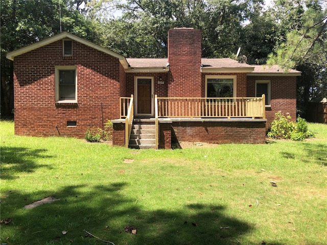 ranch-style home with a front yard