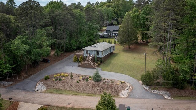 drone / aerial view with a forest view