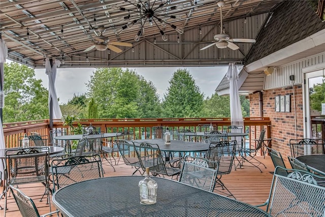 deck with a ceiling fan and outdoor dining area