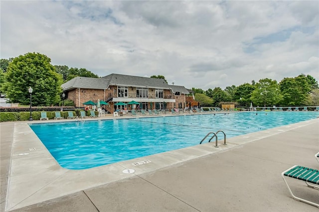 community pool featuring a patio area