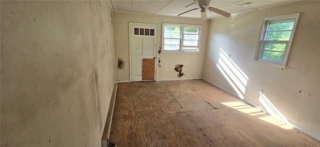 spare room featuring hardwood / wood-style flooring and ceiling fan