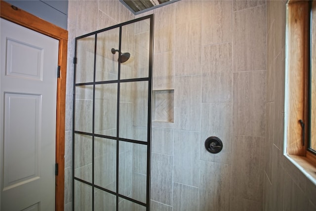 interior space with a tile shower