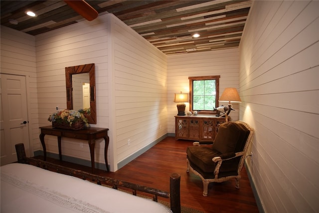 interior space with beam ceiling and dark wood-type flooring