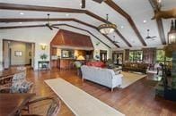 1230 Melton Rd Unit 99, West Union, SC 29696 - living area featuring wood finished floors, a ceiling fan, and vaulted ceiling with beams