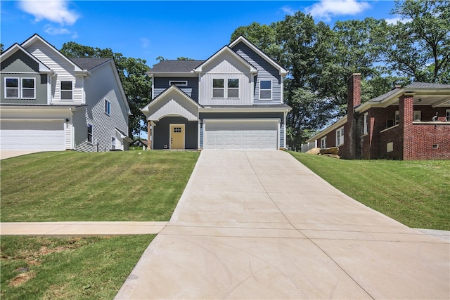 view of front facade with a garage and a front lawn