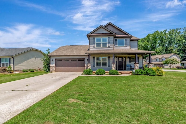 craftsman inspired home featuring a garage, a porch, and a front lawn