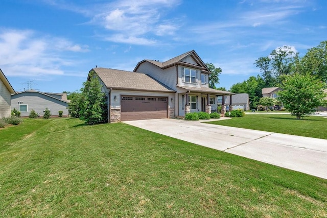 craftsman-style home with a garage, covered porch, and a front lawn