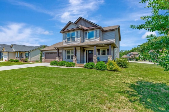 craftsman inspired home featuring a garage, a front yard, and covered porch