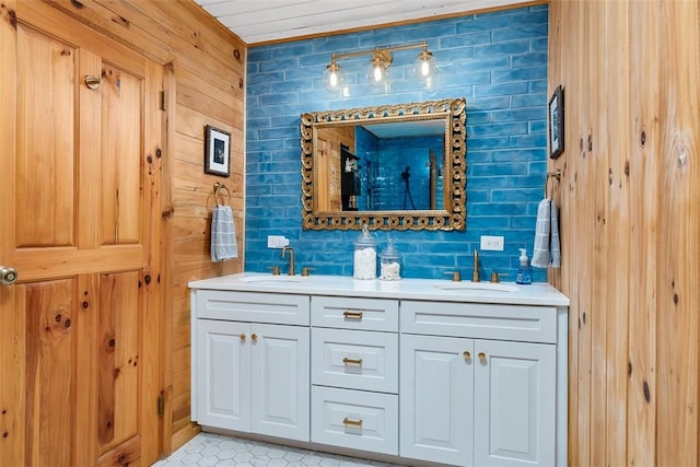 bathroom featuring tile patterned flooring and vanity