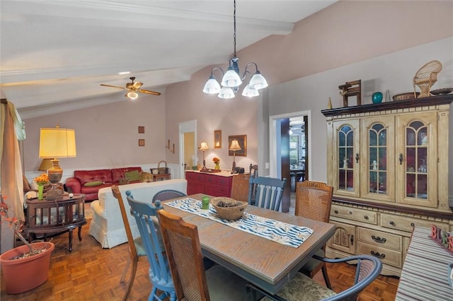 dining area featuring light parquet flooring, ceiling fan with notable chandelier, and vaulted ceiling with beams