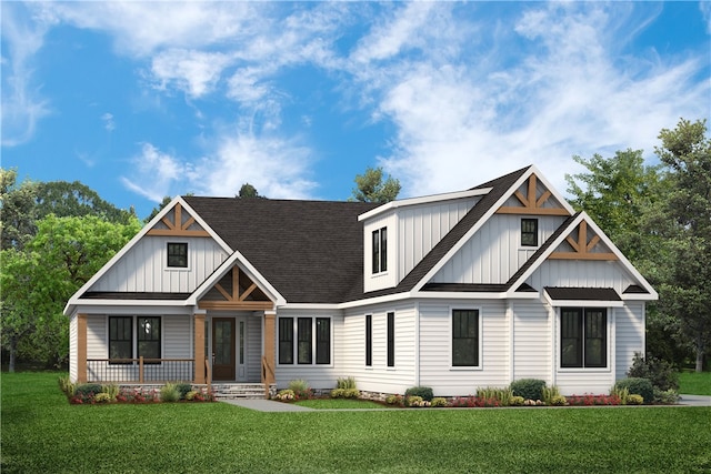 view of front of house featuring a front lawn and covered porch